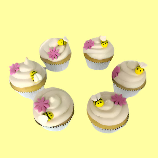 Bee-themed cupcakes decorated via a DIY cupcake-decorating kit available during open studio time or to-go kit from Cake Hoopla in Tigard, near Portland.