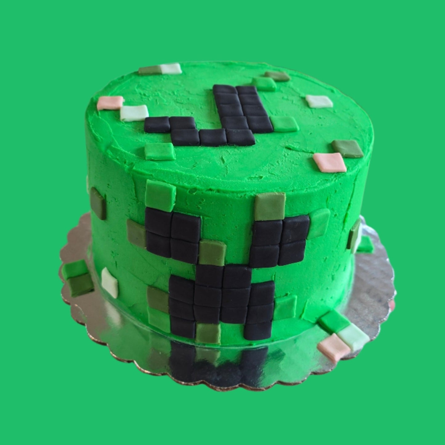 Custom Creeper Minecraft cake decorated by Cake Hoopla, available for custom order for pickup in Tigard, near Portland.