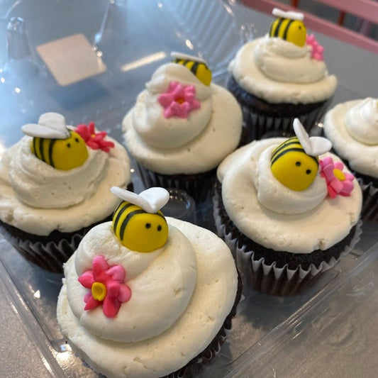 A customer's 6 cupcakes after decorating the Beeyonce's DIY cupcake-decorating kit during open studio time at Cake Hoopla in Tigard, near Portland.