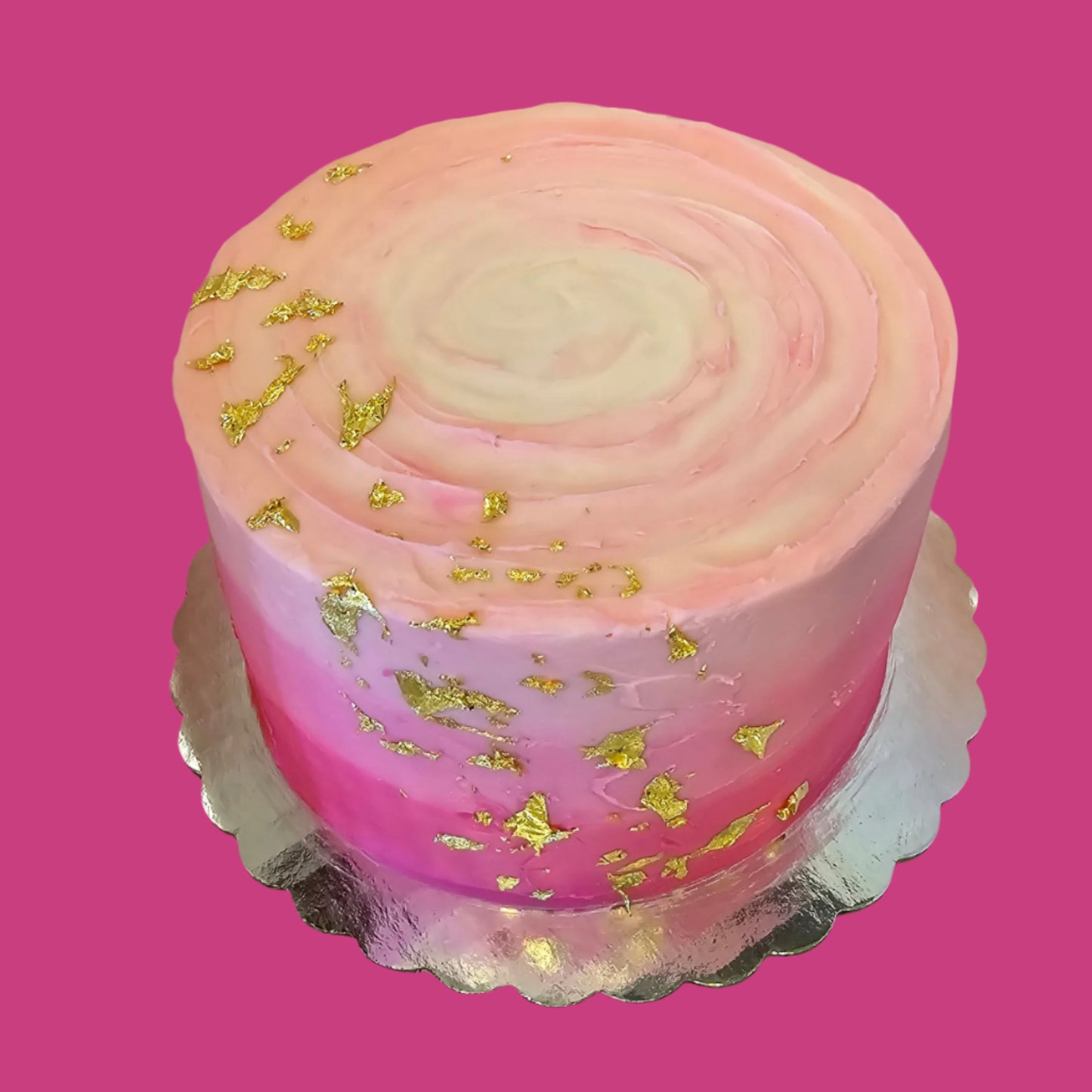 Custom ordered pink ombre cake with gold flakes by Cake Hoopla in Tigard, near Portland.