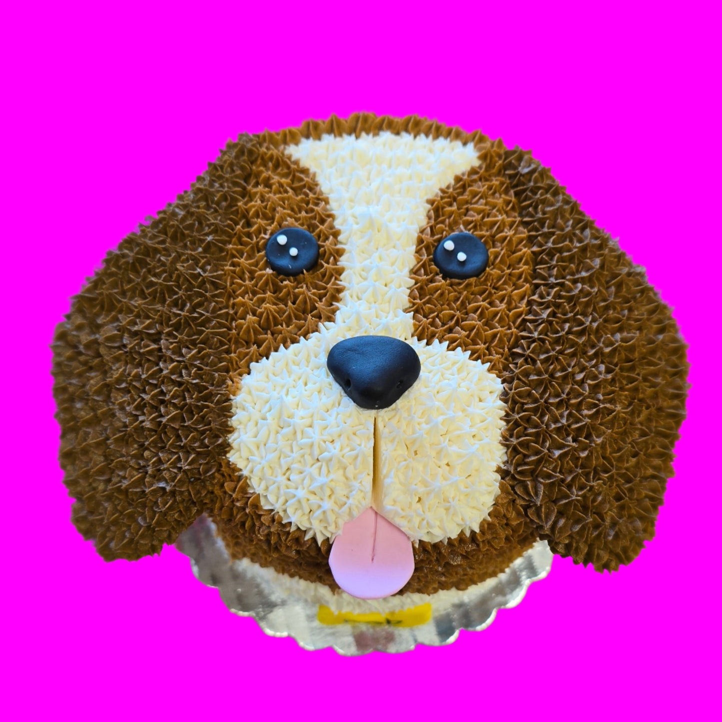 Custom puppy cake with brown and white features, piped stars as fur, available by preorder from Cake Hoopla in Tigard, near Portland.