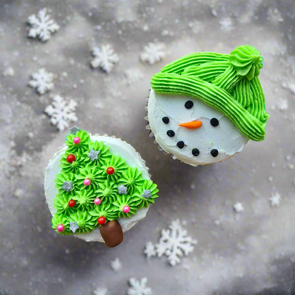 Colorful snowperson cupcakes and Christmas trees decorated at Cake Hoopla's DIY cake/cupcake-decorating event in Tigard, Oregon near Portland.