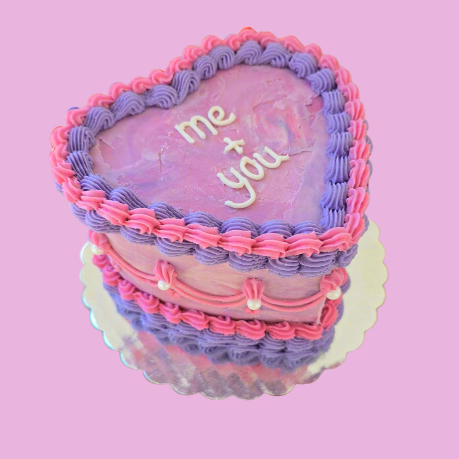 vintage-style heart cake from Cake Hoopla available for Valentine's Day with personalized frosting message written on top available for pickup at Cake Hoopla in Tigard, Oregon near Portland.