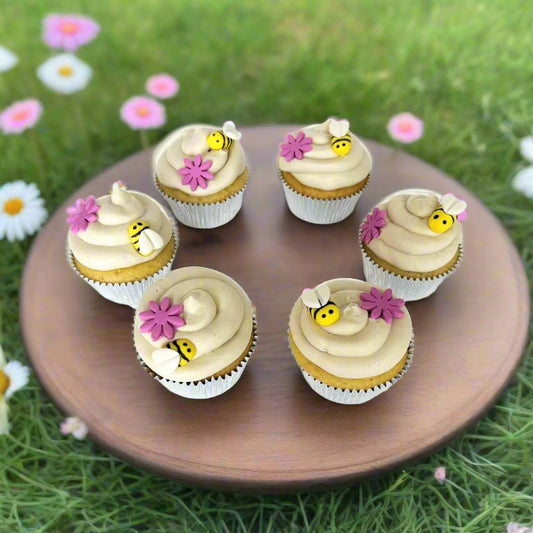 Bee-themed cupcakes decorated via a DIY cupcake-decorating kit available during open studio time or to-go kit from Cake Hoopla in Tigard, near Portland.