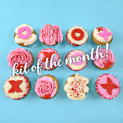Valentine's themed cupcakes with pink and white frosting and red and pink Xs and Os, with "kit of the month" written across the graphic.