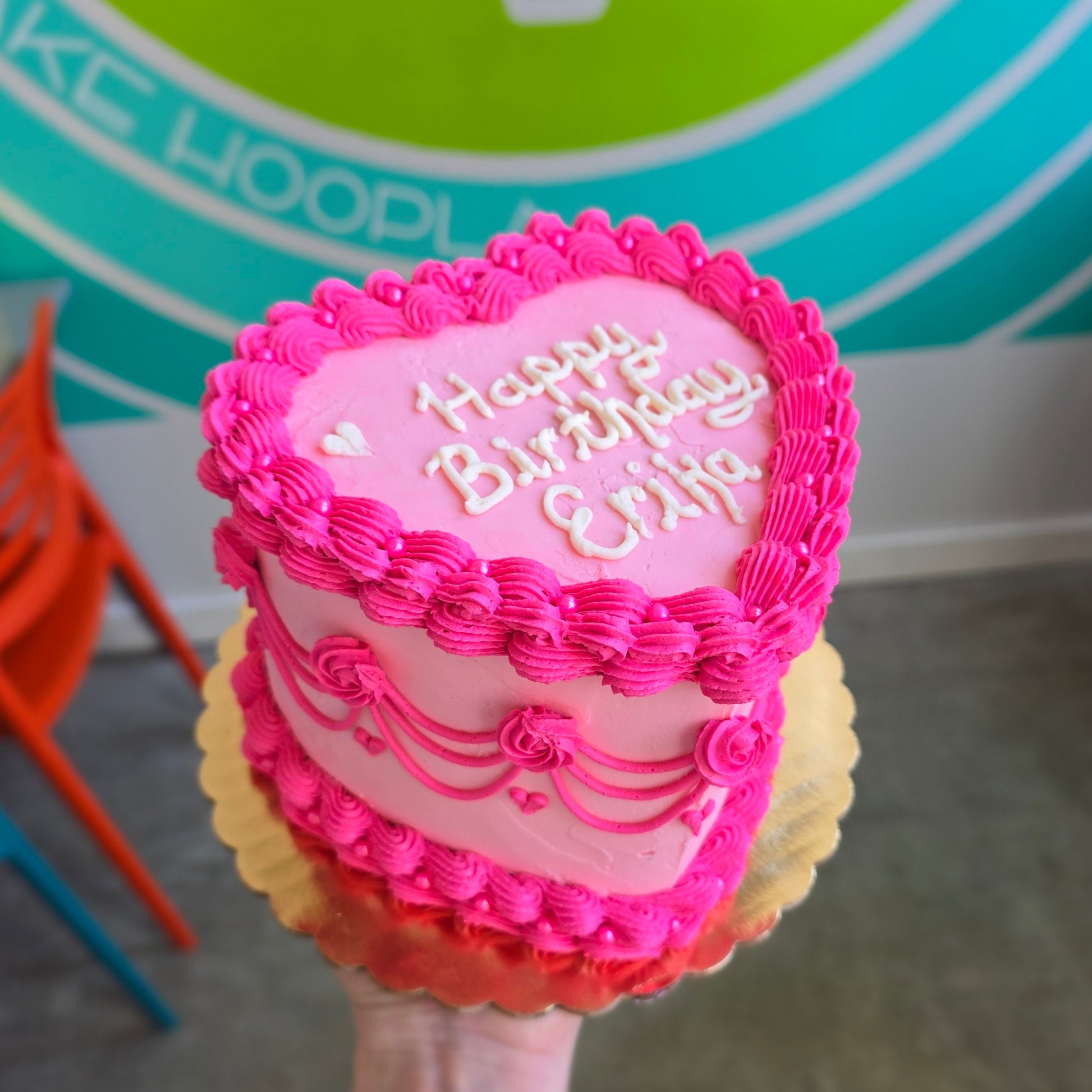 Pink vintage heart cake with happy birthday message by customer at Cake Hoopla in Tigard.