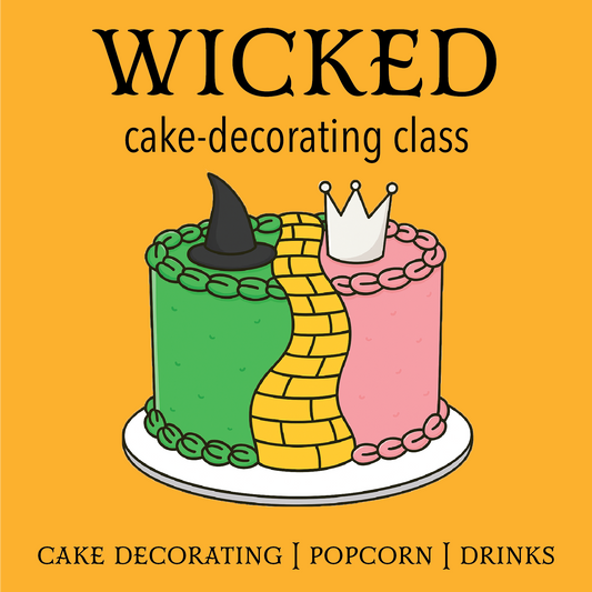 A cake split green and pink in Wicked style, with a yellow brick road down the center and a witch's hat and tiara on top for a cake-decorating class at Cake Hoopla in Tigard, near Portland.