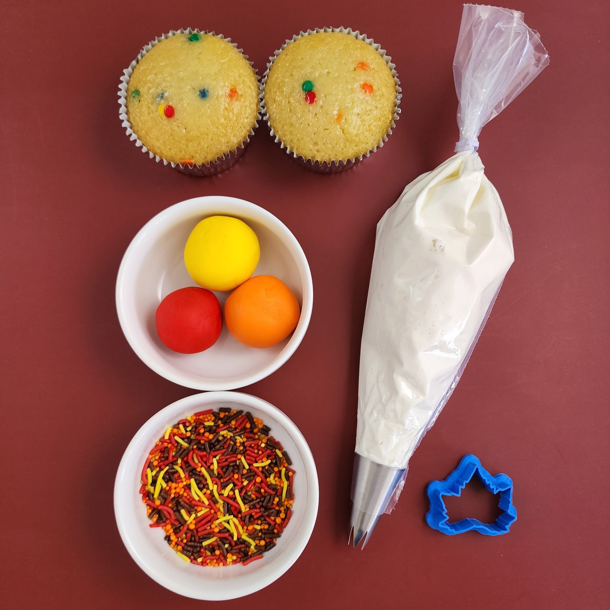 The components of the Fall-Lelujah DIY cupcake-decorating kit, with cupcakes, frosting, fondant, and sprinkles, available during open studio time or to-go from Cake Hoopla in Tigard, Oregon near Portland.