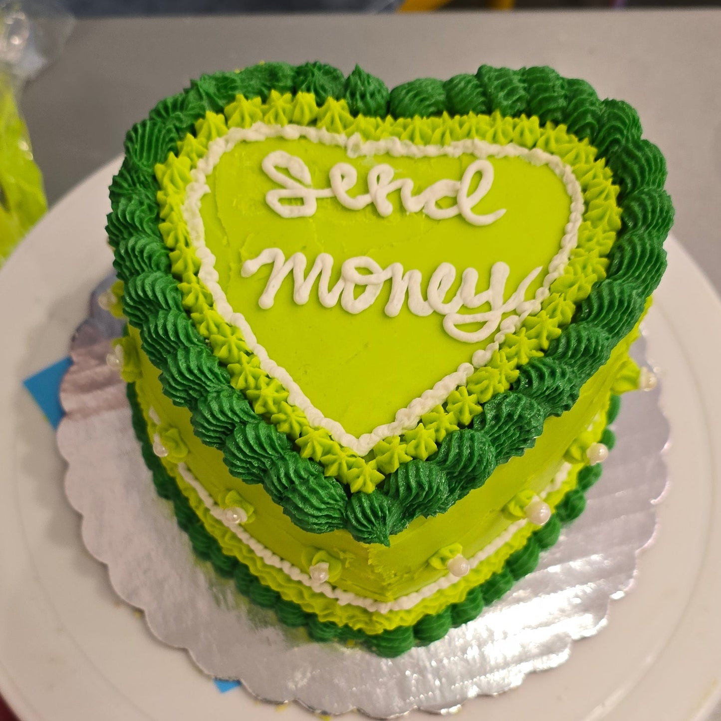 Dark and light green vintage heart cake created at a Cake Hoopla class in Tigard, near Portland.
